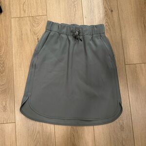 Women’s lululemon green skirt, size 4, worn twice, no shorts underneath.